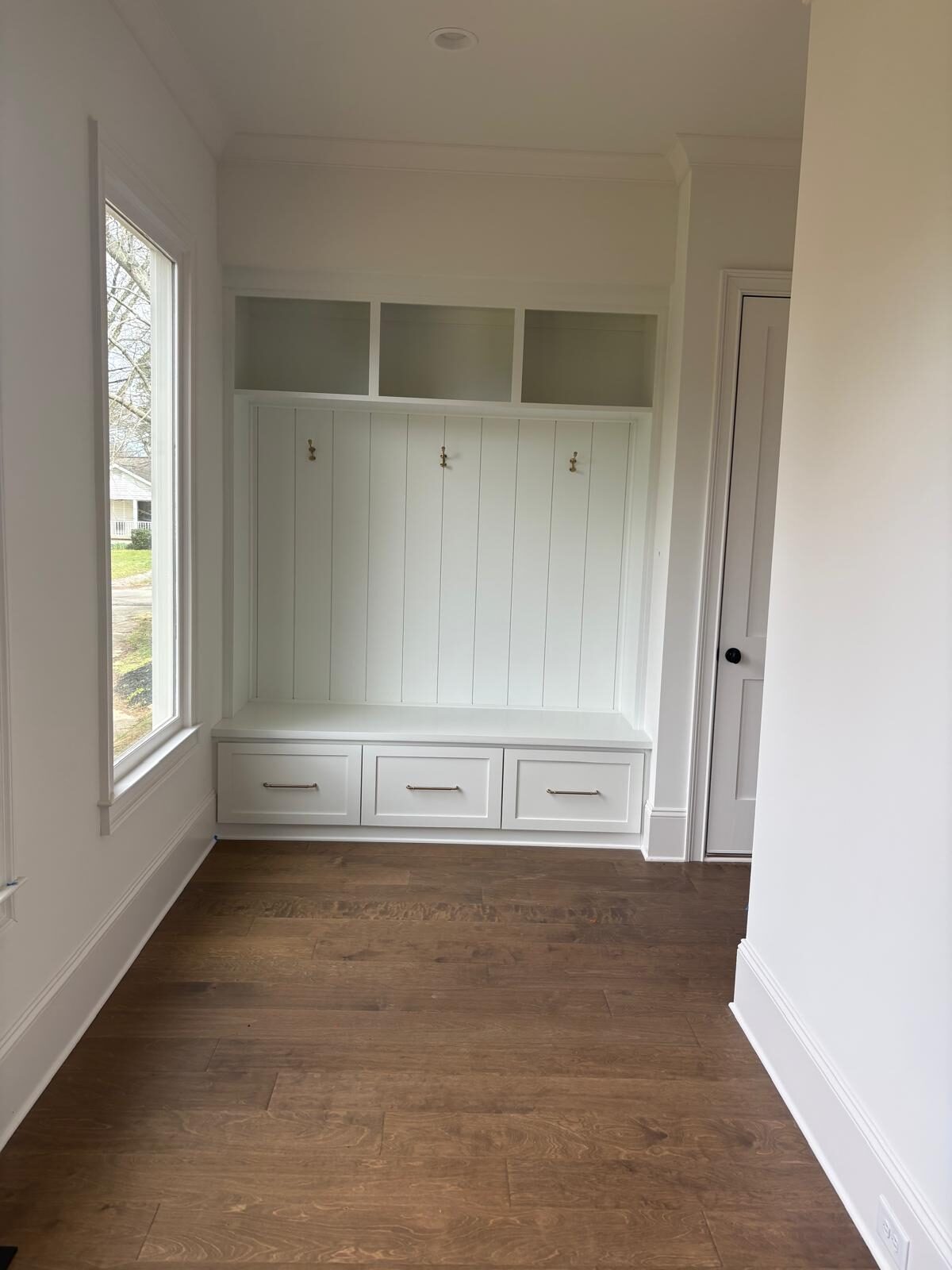 Custom mudroom bench with cubbies and drawers